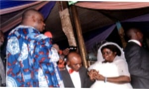  General Overseer, Omega Power Ministry,  Apostle Chibuzor Chinyere (2nd left), joining the oldest couple, 71-year old  Pa Samuel and Madam Chinyere  Arewa, 61, during a mass wedding conducted at OPM’s  headquarters in Port Harcourt, recenlty.