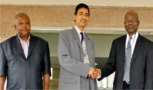 Counselor (Commercial and Project), High Commission of India, Mr Machender Kanyal (middle), welcoming The Chairman, Local Organising Committee (Loc) of the 2016 World Mayors-African Region Investment Conference, during the Committee's chairman working visit to the commission in Abuja on Tuesday. With them is the Conference Manager, Mr George Igoche.