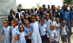 Rivers State Governor,  Chief Nyesom Wike with pupils of Santa Maria Nursery and Primary School in Port Harcourt shortly after inspecting work on the NLNG-NKPOGU Bridge on Friday