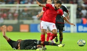 Captain of Al Ahly (2nd left) trying to go past an opponent in a recent game.