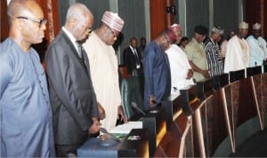 A cross-section of Ministers observing 'one minute silence', during  a special session of the Federal Executive Council meeting in honour of their late colleague, Minister of State for Labour and Employment, James Ocholi , in Abuja on Wednesday 