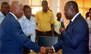 CEO, Charkin, Maritime and Safety Institution, Sir Charles K. Wami (right) in a hand shake with the Vice Chancellor RSUST Prof. Blessing Didia shortly after donating some sets of desk top computers to the department of maritime of RSUST last Wednesday. With him are departmental staff of the  institution.                         Photo: Nwiueh Donatus Ken