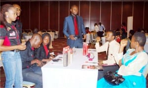 Airtel High Value Sales Executive, Mr Okogbue  Nnamdi (3rd right), attending to some participants  at  the association of Chartered Certified Accountants  (Acca),  2016 Nigerian Summit in Abuja  recently