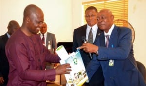 Acting Vice Chancellor Rivers State University of Science and Technology Nkpolu Port Harcourt,  Prof. Blessing Didia (right), presenting souvenir to the State Chairman NUJ, Mr. Ayo Tamuno, during a working visit to the acting vice chancellor recently.                     						          Photo: Nwiueh Donatus Ken