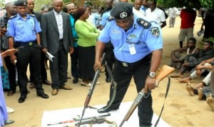  Plateau State Commissioner of Police, Mr Adekunle Oladunjoye displaying weapons recovered from suspected criminals in Jos on Tuesday 