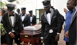 Undertakers carrying the coffin bearing body of the late Minister of State for Labour and Employment, Mr James Ocholi at the National Hospital in Abuja to his home town in Kogi State on Wednesday