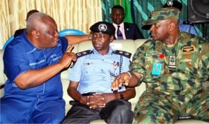 L-R: Resident Electoral Commissioner, Inec Rivers State, Mr Aniedi Ikoiwak;Rivers State Commissioner of  Police, Musa Kimo and Commander 97 Special Operation Group, Nigerian Air Force Port Harcourt, Air Commodore Charles Onwo during a meeting with politicians and candidates for the 19th March  Re-run Election in Port Harcourt on Wednesday.