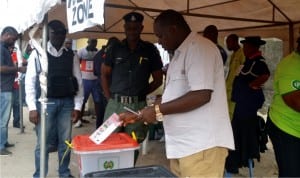 Senator George Thompson Sekibo (right) casting his vote during Rivers National and State Assembly Re-run election at Ogu-Bolo Local Government Area Saturday. Pix: Nwiueh Donatus Ken.