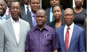 L-R: Rivers Commissioner for Justice and Attorney General, Mr Emmanuel Aguma (SAN), Rivers State Governor, Chief Nyesom Wike and Chairman, Nigeria Bar Association, Port Harcourt branch, Mr Denis Okwakpam, after the governor's inauguration of the Local Organizing Committee for the 2016 NBA Conference in Port Harcourt on Wednesday