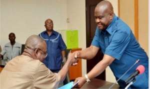 Rivers State Governor, Chief Nyesom Wike (right), receiving a document from the President, Ogbakor Ikwerre, United States and Canada branch, Mr Fortune Woluwo, during the courtesy visit of the delegation to the Governor in Port Harcourt, recently.