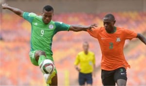 Emenike (9) during his day with the Super Eagles