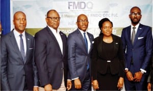 L-R: Chief Executive Officer, Nigerian Stock Exchange, Oscar Onyema, Director, Financial Market Dealers Quotation (FMDQ), Dr Adesola Adeduntan, Managing Director, Mr  Bola Onadele Koko, Chairman, Mrs Sarah Alade and Company Secretary, Mr  Ajibola Asolo,  at the 4th FMDQ Annual General meeting in Lagos, last Firday.