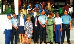 i-g Solomon Arase (4th right), Director of Operations, ineqe Group, Mr Gary White, Head, West Africa Conflict, Stability and Security, Catherine Weiss (3rd left), and other top security officers at a roundtable discussion on security  stabilisation in Abuja, recently.