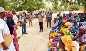 The Chief Executive Officer of Murtala Muhammed Foundation  (mmf), Mrs Aisha Muhammed-Oyebode (2nd left), addressing some of the  parents of abducted Chibok Girls at a meeting with them in Chibok  Borno State on Monday.