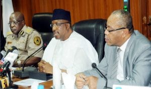 L-R: Comptroller-General of Immigration, Mr Martin Abeshi, Minister of Interior, Lt.-Gen. Abdulrahaman Dambazau and Permanent Secretary, Minstry of Interior, Mr Bassey Akpanyung, at the Strategic Stakeholders Meeting on Pastoralist and Sedentary Farmers Conflict in Nigeria in Abuja on Thursday