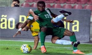 Flying Eagles player struggling to get the ball