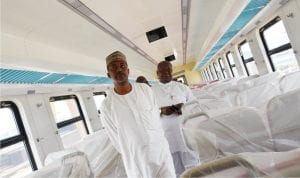 Permanent Secretary, Ministry of Transportation,  Mr Sabiu Zakari (Front), inspecting  the interior  of the newly arrived Commercial Coaches for Abuja  rail project  during his visit to Idu in Abuja  recently.  With him is the Acting Managing Director, Nigerian Railway Corporation, Mr  Fidet Okhiria.