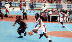 Female basketball players in competition