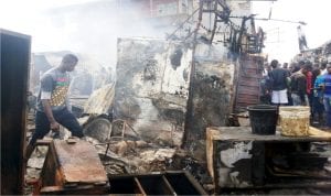 Scene of fire incident at a section of Ladipo Auto Market in Mushin, Lagos State, on Wednesday