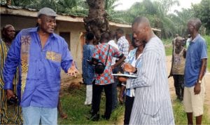 The owner of Ardis Farm, Chief Ayodele Adigun (left), speaking with newsmen over invasion of the farm by armed robbers in Lagun  Lagelu local government area of Oyo State recently.