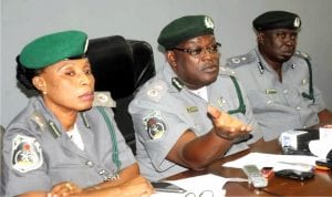 L-R:Acting Deputy Comptroller of Customs in charge of Revenue, Mrs Elizabeth Isofi, Customs Area Comptroller Oyo/Osun Area Command, Mr  Temitope Ogunkua and Deputy Comptroller  (Adm), Mr Abdulsalam Hassan, at a news conference on the activities ot the Command, recently.