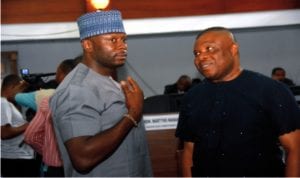 Speaker of Rivers State House of Assembly, Rt Hon Adams Dabotorudima (right) chatting with Hon Tonye Adoki, during the sitting of the House yesterday.