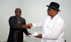 Acting General Manager Rivers State Newspaper Corporation,  Soye Wilson-Jamabo (right) receiving an address from the Chairman Nigeria Union of Journalists, Tide Chapel, Mr Felix Okogbule, during the management  meeting with the Unions, yesterday.  Photo:Chris Monyanaga 