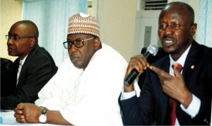 L-R: Director of Public Affairs, Economic and Financial Crimes Commission (EFCC), Mr Osita Nwajah, Permanent Secretary, Federal Ministry of Works and Housing, Mr Abubakar Magaji and the acting EFCC chairman, Mr Ibrahim Magu, during the EFCC interactive session with staff of the works and housing  sectors in Abuja recently.