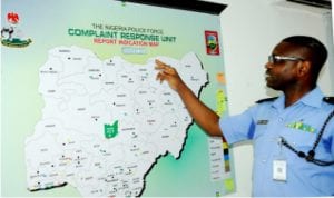 Police officer in charge of Nigeria Police Force Complaint Response Unit, CSP Abayomi Shogunle (right), explaining the Police Force Complaint Response Areas to newsmen during journalists’ visit to Police Headquarters in Abuja last Saturday.