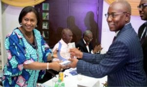 Rivers State  Deputy Governor,   Dr. (Mrs) Ipalibo Harry Banigo (left), receiving a plaque (award of excellence) from Dr. Emi Membere-Otaji, President, Port Harcourt Chamber of Commerce, Industry, Mines & Agriculture (PHCCIMA), during the 1st Port Harcourt Chamber of Commerce Business Luncheon at the Obi Wali International Conference Centre, Port Harcourt.