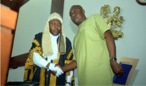 Speaker, Rivers State House of Assembly, Rt Hon. Adams Dabotorudima (left), congratulating Hon Samuel Ogeh after his wearing-in as a member of 8th Assembly last  Thursday, following his victory at the 19th March rerun election in Rivers State.                Photo: Chris Monyanaga