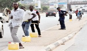 Fuel hawkers at the Central Area at Garki in Abuja last Thursday