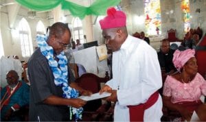 Senior Special Adviser on Security to the Deputy Governor Dr. (Mrs) Ipalibo Harry Banigo, Elder Emmanuel Ibama, presenting address to the Bishop, Niger Delta Diocese Rev. Ralph Ebirien at the 2nd Session of the 22nd  Synod of the Diocese at St Augustine Anglican Church, Abonnema in Akuku-Toru Local Government Area.  