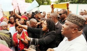 Gov. Ifeanyi Ugwuanyi of Enugu State (right), addresing a coalition of women groups during a protest over recent attack on people by herdsmen in Enugu on Tuesday.