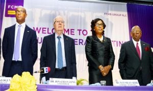 L-R: Group Managing Director, First City Monument Bank (Fcmb) Plc, Mr Ladi Balogun; Chairman, Dr Jonathan Long; Company Secretary, Mrs Funmi Adedibu and  founder, Otunba Michael Balogun,  during the 3rd  Annual General Meeting in Lagos last Friday.