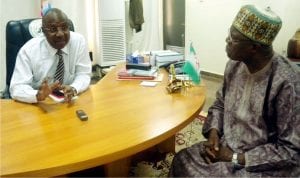 Governor Muhammadu Jibrillah of Adamawa (left), discussing with the Acting Managing Director, News Agency of Nigeria (Nan), Mr Jones Afolabi, during a courtesy visit to the Governor at the Government House, Dougirie Inyola recently