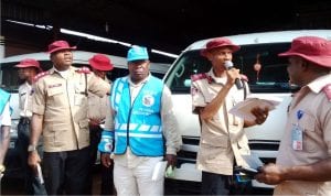 Deputy Corps Commander, Federal Road Safety Corps(FRSC), Edo State Sector Command,  Mr Obisike Uchendu (2nd right) and other officers enlightening motorists on the dangers of over  speeding, during the Annual West Africa Road Safety Organisation Day  in Benin, recently.