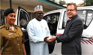 R-L: United Stated Consul General, Francis John Bray, Chairman,/Chief Executive, National Drug Law Enforcement Agency (NDLEA), Col. Muhammad Mustapha Abdallah, with the Director General of NDLEA, Mrs Roli Bode-George, during the donation of 11 pick up trucks and transport vans to the NDLEA by the U.S. Consulate in Lagos, yesterday. Photo: U.S. Consulate General, Lagos
