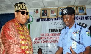 Chairman, Rivers State Traditional Rulers' Council and Amanyanabo of Opobo, King Dandeson Jaja in a handshake with the Commissioner of Police, Mr Musa Kimo (left), during a Town Hall meeting on Security Challenges between local communities and herdsmen organised by the police in Port Harcourt, yesterday