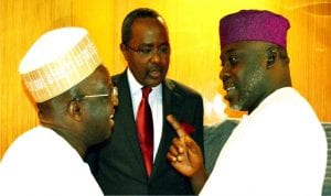 Chairman, House Committee on Capital Market, Rep. Yusuf Tajuddeen (right), discussing with representative of the Minister of Finance, Dr Mahmud Isa-Dutse (left) and Director-General, Security and Exchange Commission (SEC), Alhaji Munir Gwarzo, at the inauguration of the study team on Voice and Voting Power in the Nigerian Capital Market in Abuja on Monday.