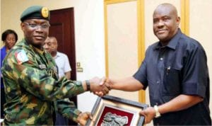 Rivers State Governor, Chief Nyesom Wike (right), receiving a souvenir from the  Chief of Defence Staff (CDS), Gen. Abayomi Olonishakin, during the CDS’ visit to  Government House in Port Harcourt on Monday 