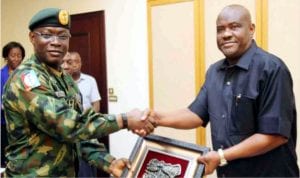 Rivers State Governor, Chief Nyesom Wike (right), receiving a souvenir from the Chief of Defence Staff (CDS), Gen. Abayomi Olonishakin, during the CDS’ visit to Government House in Port Harcourt on Monday