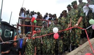 L-R: Commander, 2 Brigade, Port Harcourt, Brig.-Gen.Stevenson Olabanji, Commander, Operation Pulo Shield, Maj.-Gen. Alani Okunlola, Chief of Army Staff, Lt.-Gen. Tukur Buratai, Chief of Defence Statff, Gen. Gabriel Olonisakin, Chief of Naval Staff, Vice-Adm. Ibok-Ete Ibas and Chief of Air Staff, Air Marshal Sadique Abubakar, at the inauguration of 12 refurbished gun boats and 40 bed space accommodation for personnel in Okirika, Rivers State on Monday. 