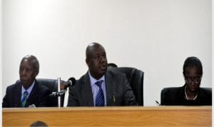 Chairman, Commission of Inquiring, Hon Justice Monima W Danagogo (middle), addressing participants at the inaugural sitting of the commission in Port Harcourt on Monday. With him are members of the commission Engr Luke Nwanodi (left) and Mrs Constance Douye Green