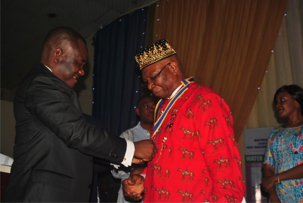 President, Rotary Club of Port Harcourt, Rtn Ferdinand Banigo (right), being decorated by former President of the Club, Rtn Harrison Dan, during the President’s induction ceremony in Port Harcourt, last Saturday. Photo: Obinna Prince Dele