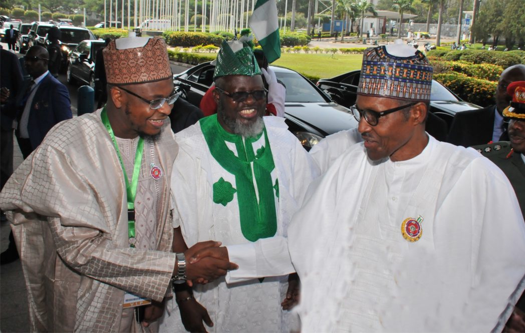 Director-General, National Information Technology Development Agency (NITDA), Dr Isa Ibrahim (left), welcoming President Muhammadu Buhari to the 2017 e-Nigeria Conference with the theme: “Fostering Digital Economy Through Local Content Development and Effective Regulations'' in Abuja, last Tuesday. With them is the Minister of Communication, Mr Adebayo Shittu.